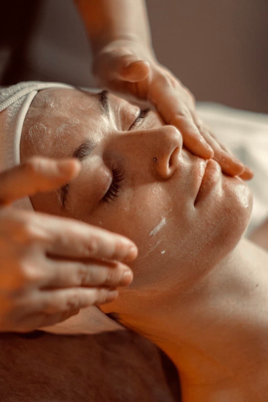Warm wooden massage tool in low light